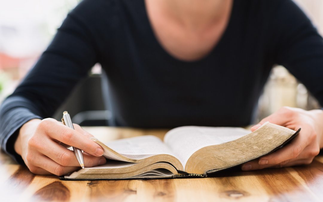 woman reading Bible